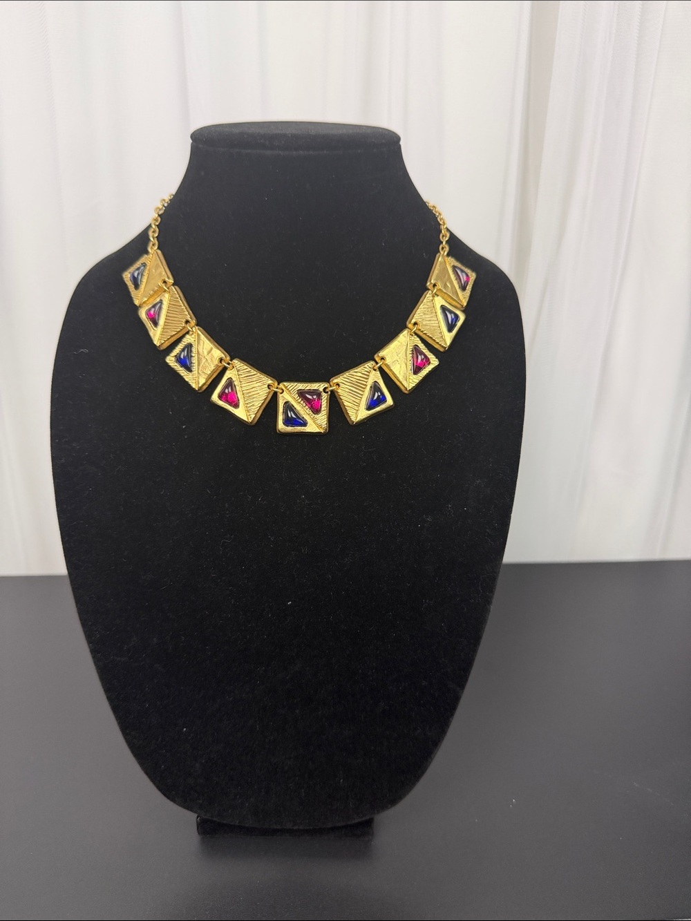Dolce Vita Gold Geometric Necklace with Blue and Pink Triangles